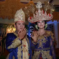 Diusianya 20 tahun, Selena resmi menjadi istri Ahmad. Akad nikah digelar di kawasan Kelapa Gading, Jakarta Utara pada 12 Desember 2015. (Deki Prayoga/Bintang.com)