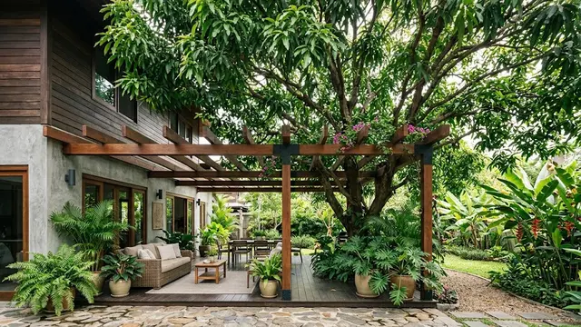 Model Teras Depan Rumah dengan Pohon Mangga Besar Jadi Peneduh Estetik