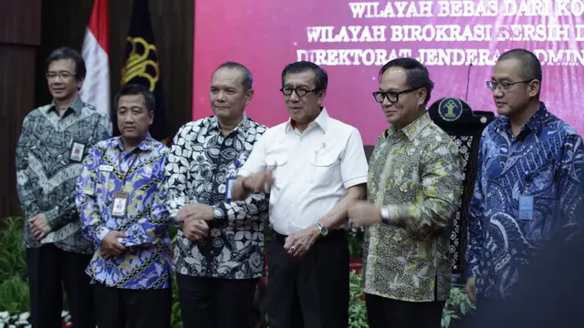 Menkumham Yasonna Laoly Direktur Jenderal Administrasi Hukum Umum (Dirjen AHU) Cahyo R Muzhar. (Istimewa)