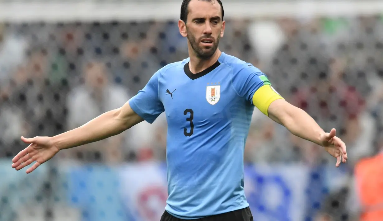 3. Diego Godin - Kedatangan Diego Simeone ke Atletico Madrid menjadi berkah tersendiri untuk Godin. Ia disulap menjadi bek dengan tingkat kedisiplinan diatas rata-rata. (AFP/Kiril Kudryatsev)
