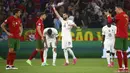 Pemain Prancis Karim Benzema (tengah) merayakan setelah mencetak gol ke gawang Prancis pada pertandingan Grup F Euro 2020 di Puskas Arena, Budapest, Hungaria, Rabu (23/6/2021). Laga berakhir imbang 2-2. (Bernadett Szabo, Pool photo via AP)