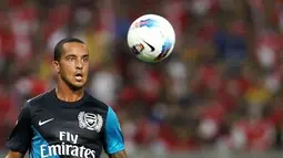 Theo Walcott turut menyumbang gol untuk Arsenal yang melumat Malaysia 4-0 dalam laga pramusim Tur Asia 2011 di Stadion Bukit Jalil, Kuala Lumpur, 13 Juli 2011. AFP PHOTO/Mohd Rasfan