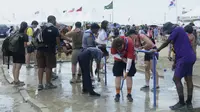 Ratusan peserta telah dirawat karena penyakit yang berhubungan dengan panas sejak Jambore dimulai Rabu di lokasi di kota pesisir Buan saat Korea Selatan bergulat dengan salah satu musim panas terpanas dalam beberapa tahun. (Kim-yeol/Newsis via AP)