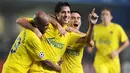 Villarreal's Joan Capdevila celebrates with Giusepe Rosi and Marcos Senna after scoring against Aalborg during their group E Champions League football match at the Madrigal Stadium in Villarreal on October 21, 2008. AFP PHOTO/DIEGO TUSON 