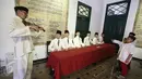  Sejumlah anak memerhatikan diorama di Museum Sumpah Pemuda di Jakarta, Jumat (28/10). Hari Sumpah Pemuda yang diperingati tanggal 28 Oktober membuat museum tersebut ramai pengunjung melihat sejarah bangsa Indonesia. (Liputan6.com/Immanuel Antonius)