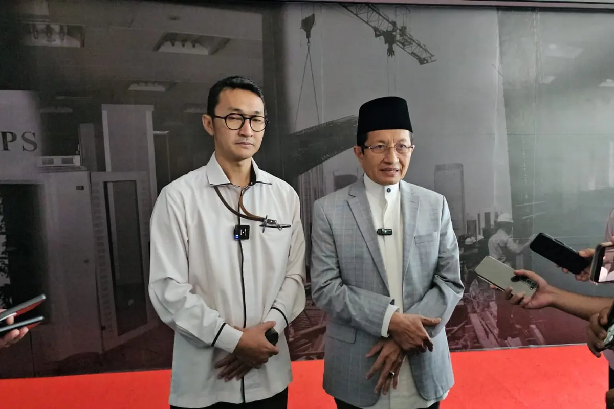 Jubir KPK Budi Prasetyo bersama Menteri Agama Nasaruddin Umar usai pelaporan dugaan gratifikasi. (Liputan6/M Radityo Priyasmoro)