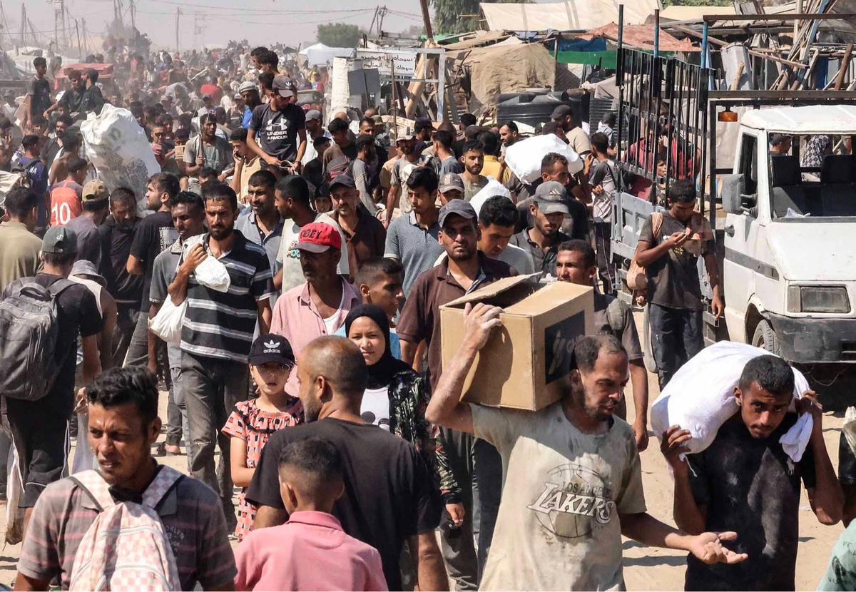 FOTO:  Israel Umumkan Jeda Taktis, Truk Bantuan Mulai Masuk Gaza