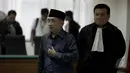 Fuad Amin Imron usai menjalani sidang lanjutan kasus dugaan suap pasokan gas alam untuk pembangkit listrik di Gresik, Pengadilan Tipikor, Jakarta, Kamis (22/5/2015). Jaksa penuntut umum menolak atas eksepsi dirinya. (Liputan6.com/Yoppy Renato)