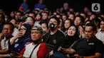 Sejumlah pengunjung menggunakan masker saat menyaksikan Java Jazz Festival 2020 di JIExpo Kemayoran, Jakarta, Jumat (28/2/2020). Promotor meminta penonton memakai masker saat menghadiri Java Jazz Festival 2020 untuk mengantisipasi penyebaran virus corona. (Liputan6.com/Faizal Fanani)