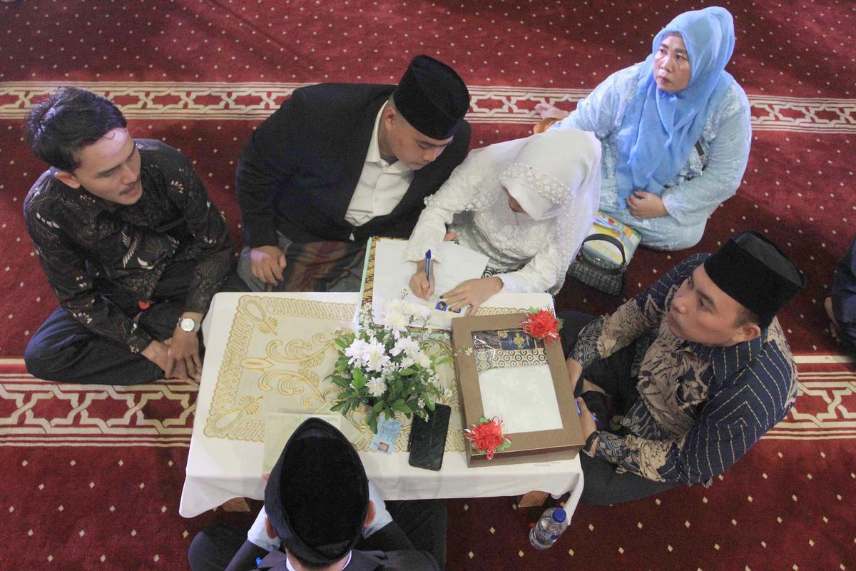 FOTO: 51 Pasangan Resmi Menikah Gratis di Masjid Istiqlal