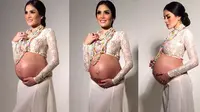 Di foto seksi kali ini, Nikita Mirzani tampil dengan memamerkan perutnya yang tengah hamil besar.