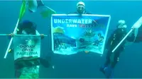 Aksi penyelam Gorontalo memberikan dukungan kepada Palestina melalui bawah Laut (Arfandi Ibrahim/Liputan6.com)