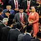 Presiden Joko Widodo didampingi Wapres Ma'ruf Amin dan Ketua DPR RI, Puan Maharani saat menghadiri rapat Paripurna pembukaan masa persidangan I DPR tahun sidang 2022-2023 di Gedung Nusantara, Kompleks Parlemen, Senayan, Jakarta, Selasa (16/8/2022). Rapat kali ini berbeda dengan rapat sidang tahunan MPR RI pagi tadi, Presiden Jokowi hadir bersama Ma'ruf Amin dengan setelah jas yang rapi. (Liputan6.com/Johan Tallo)