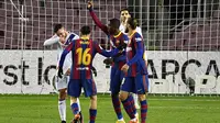 Gol Ousmane Dembele tak mampu membawa Barcelona meraih kemenangan kontra kontra Eibar pada pertandingan pekan ke-16 La Liga di Camp Nou, Rabu (30/12/2020) dini hari WIB. Barca harus puas bermain imbang 1-1. (AFP/Pau Barrena)