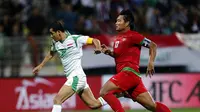 Kapten Timnas Indonesia, Wahyu Wijiastanto, saat menghadapi Irak di Grup C kualifikasi Piala Asia 2015 yang digelar di Dubai, 6 Februari 2013 (KARIM SAHIB / AFP)