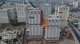 Foto areal suasana Wisma Atlet di Kemayoran, Jakarta, Kamis (1/3). Wisma atlet ini terdiri dari 10 tower yang terbagi tujuh tower di Blok D10 dengan jumlah unit 5.494 unit yang akan menampung 16.482 orang. (Liputan6.com/Arya Manggala)