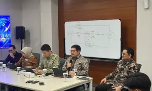 Kepala Departemen Pengelolaan Moneter dan Aset Sekuritas BI, Erwin Gunawan Hutapea, dalam Taklimat Media di Kantor BI, Jakarta, Jumat (23/10/2026). (Liputan6.com/Tian)