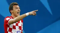 Nama pemain depan Kroasia, Mario Mandzukic ikut menghiasi daftar sementara Topskorer pekan pertama Piala Dunia 2014, (19/6/2014). (REUTERS/Murad Sezer)