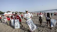 Pembersihan dan pemeliharaan pantai sebagai tempat wisata dalam bali's big eco weekend