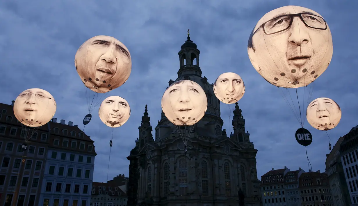 Balon yang menggambarkan wajah pemimpin negara anggota G7 menghiasi kota Dresden, Jerman, (27/5/2015). Kanselir Jerman Angela Merkel mengatakan, tak terbayangkan bila Rusia berpartisipasi dalam pertemuan G7. (REUTERS/Fabrizio Bensch)