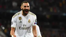 2. Karim Benzema (16 gol) - Benzema tampil produktif di laga pekan ke-29 saat Real Madrid menghadapi Valencia. Pemain asal Prancis ini mencetak dua gol dan telah mengumpulkan 16 gol saat ini. (AFP/Gabriel Bouys)