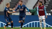 Arsenal bermain imbang 3-3 kontra West Ham United pada laga pekan ke-29 Premier League di London Stadium, Minggu (21/3/2021) malam WIB. (PAUL CHILDS / POOL / AFP)
