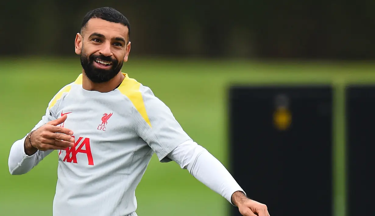 Pemain depan Liverpool, Mohamed Salah bereaksi saat berlatih di tempat latihan tim di Liverpool, barat laut Inggris, pada 16 September 2024. (Peter POWELL/AFP)