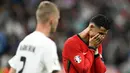 Cristiano Ronaldo tampil sebagai eksekutor dan melepaskan tembakan ke arah kanan penjaga gawang Slovenia, Jan Oblak. (PATRICIA DE MELO MOREIRA/AFP)