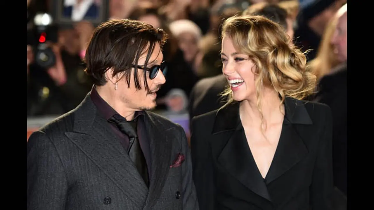 Potret Kemesraan Johnny Depp dan Amber Heard di London