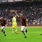 Andre Silva mencetak gol penentu kemenangan AC Milan atas Chievo dalam lanjutan Liga Serie Italia di Stadion San Siro, Minggu (18/3/2018) malam WIB. AC Milan menang 3-2. (MIGUEL MEDINA / AFP)