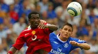 Mantan pemain Manchester United, Eric Djemba-Djemba. (AFP/JIM WATSON).