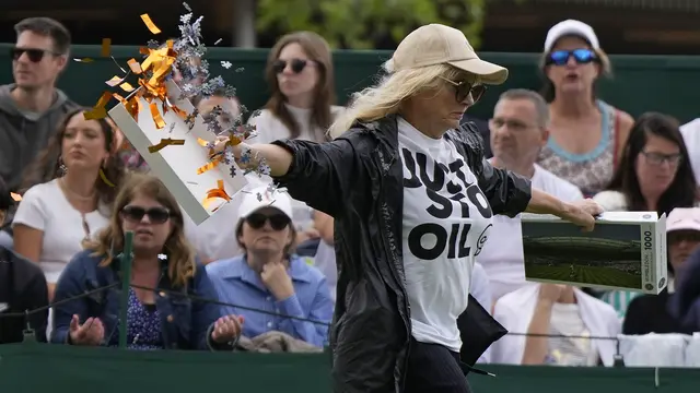 Just Stop Oil menyerbu lapangan Wimbledon dengan confetti oranye