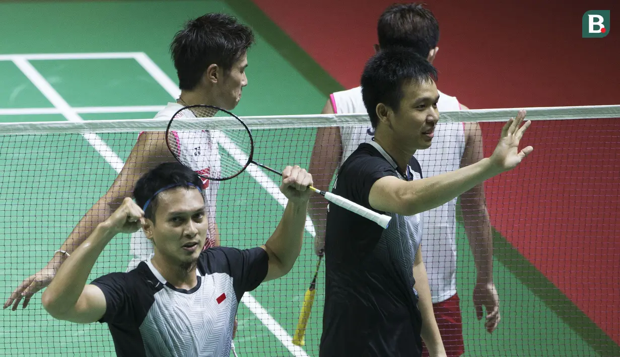 Aksi ganda putera Hendra Setiawan / Mohammad Ahsan pada semifinal Indonesia Open 2019 di Istora Senayan, Jakarta, Sabtu (20/7/2019).

(Bola.com/Peksi Cahyo)