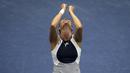 Ekspresi petenis Italia, Flavia Pennetta, sesaat setelah menjuarai Tenis AS Terbuka 2015 di New York, AS. (13/9/2015). (Reuters/Carlo Allegri)