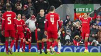 Selebrasi striker Liverpool, Cody Gakpo (kanan) setelah mencetak gol kedua timnya ke gawang Fulham pada laga leg pertama babak semifinal Carabao Cup 2023/2024 di Anfield Stadium, Liverpool, Kamis (11/1/2024) dini hari WIB. (AP Photo/Jon Super)