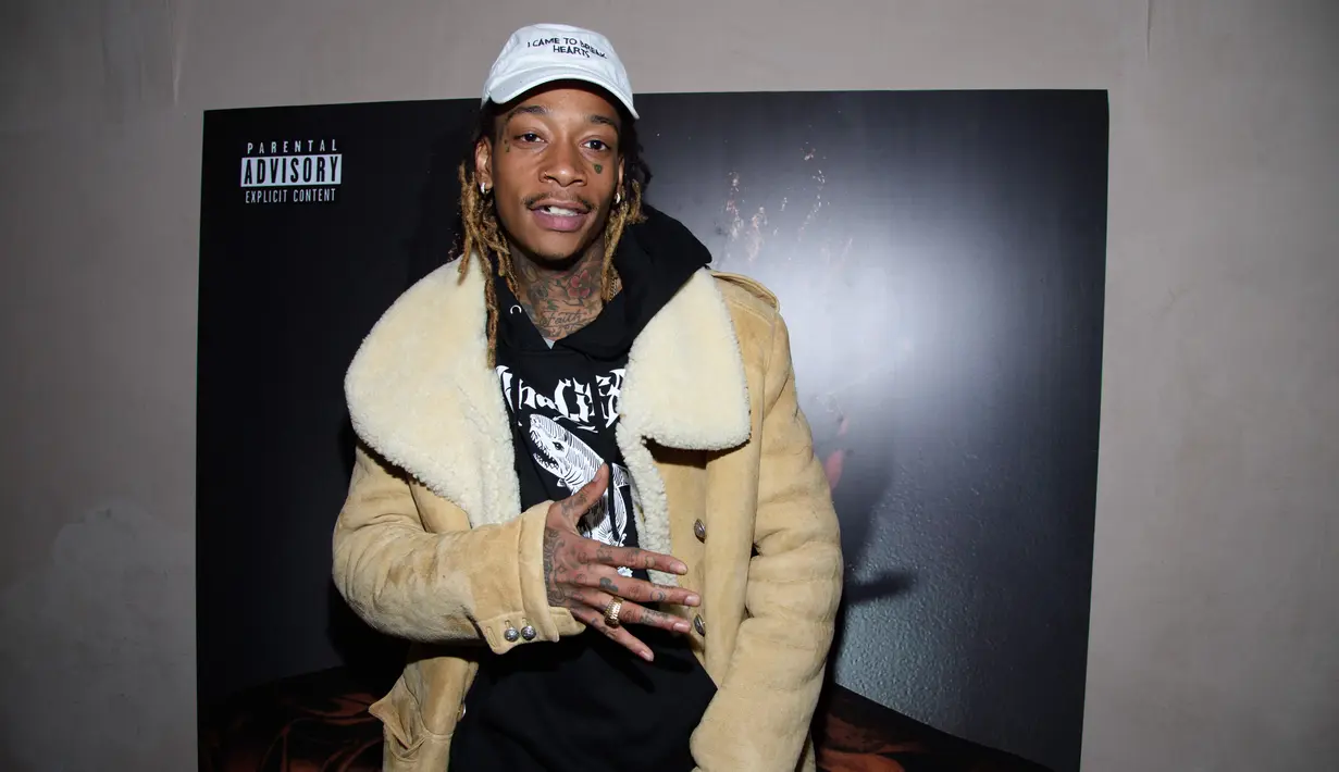 Wiz Khalifa pernah dikabarkan selingkuh dengan seorang waria hingga membuat hubungannya dengan Amber Rose berpisah. Dalam perpisahan itu, Amber sudah mengetahui bahwa Wiz sudah berhubungan dengan waria bernama Amiyah Scott (Dave Kotinsky/Getty Images/AFP)