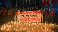 Badan Eksekutif Mahasiswa (BEM) Nusantara menggelar aksi simbolik pemasangan seribu lilin di depan Gedung Mahkamah Konstitusi (MK), Jakarta, Selasa (17/10/2023) malam (Istimewa)