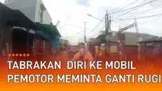 Video pemotor tabrakan dirinya ke mobil beda arah mengundang perhatian.
