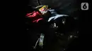 Seorang anak tidur di posko pengungsian di Taman Prawatasari, Kabupaten Cianjur, Jawa Barat, Selasa (22/11/2022). Gubernur Jawa Barat Ridwan Kamil menyebut, sebanyak 14 posko pengungsian didirikan untuk memfasilitasi warga berjumlah 13.784 pengungsi yang terdampak gempa berkekuatan 5,6 SR di Kabupaten Cianjur. (Liputan6.com/Herman Zakharia)