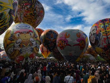 Suasana meriah mewarnai Festival Balon Wonosobo 2025 di Lapangan Wringinanom, Wonosobo , Jawa Tengah, Sabtu (5/4/2025). (merdeka.com/Arie Basuki)