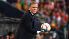 Ronald Koeman resmi sebagai pelatih baru Barcelona menggantikan Quique Setien. Pelatih berusia 57 tahun ini menandatangani kontrak bersama Barcelona dengan durasi dua tahun hingga 30 Juni 2022. (AFP/Gabriel Bouys)