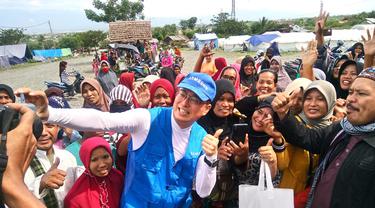 Bantuan dari Samsung untuk pengungsi gempa Palu (foto: Liputan6.com/Sulung Lahitani)