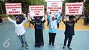 Siswa SMP dari perwakilan delapan sekolah di Jakarta dan Bandung mengikuti kegiatan bertajuk 'Sekolah Tanpa Advertensi Rokok (STAR): Menolak Diam' di Taman Menteng, Jakarta, Sabtu (21/11). (Liputan6.com/Immanuel Antonius)