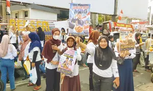 warga yang tergabung dalam Aliansi Masyarakat Lampung Mendukung Makan Bergizi Gratis, menggelar aksi di Tugu Adipura, Kota Bandar Lampung. (Liputan6.com/Ardi Munthe).