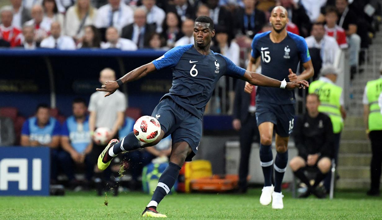 Paul Pogba menambah keunggulan Prancis pada menit ke-59 melalui sepakan kerasnya. (AFP/Christophe Simon)