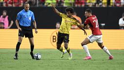 Borussia Dortmund menag atas Manchester United dengan skor 3-2. (Candice Ward/Getty Images/AFP)