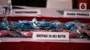 Barang bukti dihadirkan saat pemusnahan barang bukti narkotika di Jakarta, Rabu (24/8/2022). Tersangka dan barang bukti yang disita berasal dari operasi pada periode 25 Mei 2022 hingga 20 Juli 2022. (Liputan6.com/Faizal Fanani)