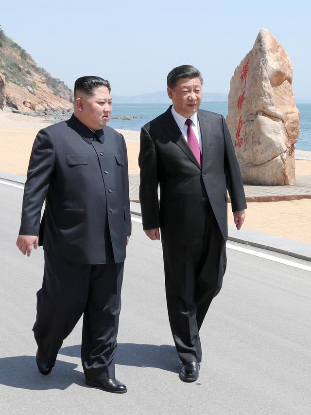 Xi Jinping dan Kim Jong-un