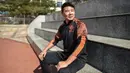 Mantan penyerang Manchester United, Dong Fangzhuo berpose untuk sebuah foto saat wawancara dengan AFP di Xiamen di provinsi Fujian, China (10/12/2019). Dong Fangzhuo yang kini berusia 34 tahun melatih anak-anak di China, beberapa di antaranya berkebutuhan khusus. (AFP/Hector Retamal)