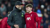 Jurgen Klopp puas dengan penampilan Connor Bradley saat membela Liverpool menghadapi Fulham pada semifinal leg 1 Carabao Cup.&nbsp;(AP Photo/Jon Super)